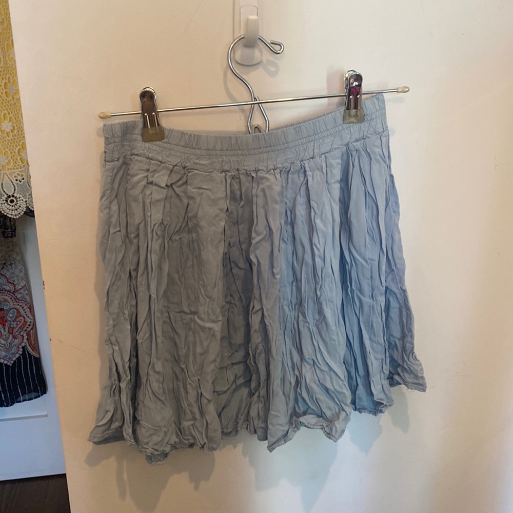 Brandy Melville light blue flowy short skirt